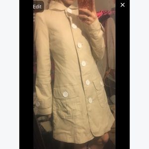 Woman's patient tan trenchcoat